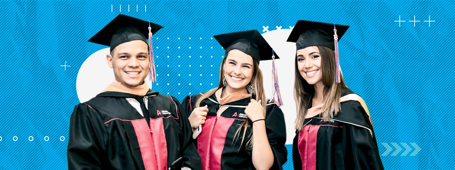 Atlantis University graduates in caps and gowns celebrating at commencement